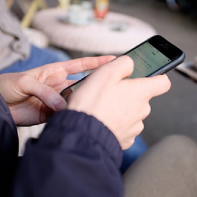 Using mobile phone in a cafe httpbarnimagescom