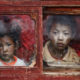 Jean-Claude Louis ©, Boy and Girl in Window, Tagong, Tibet, 2007