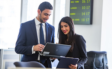 Colleagues discussing financial market services