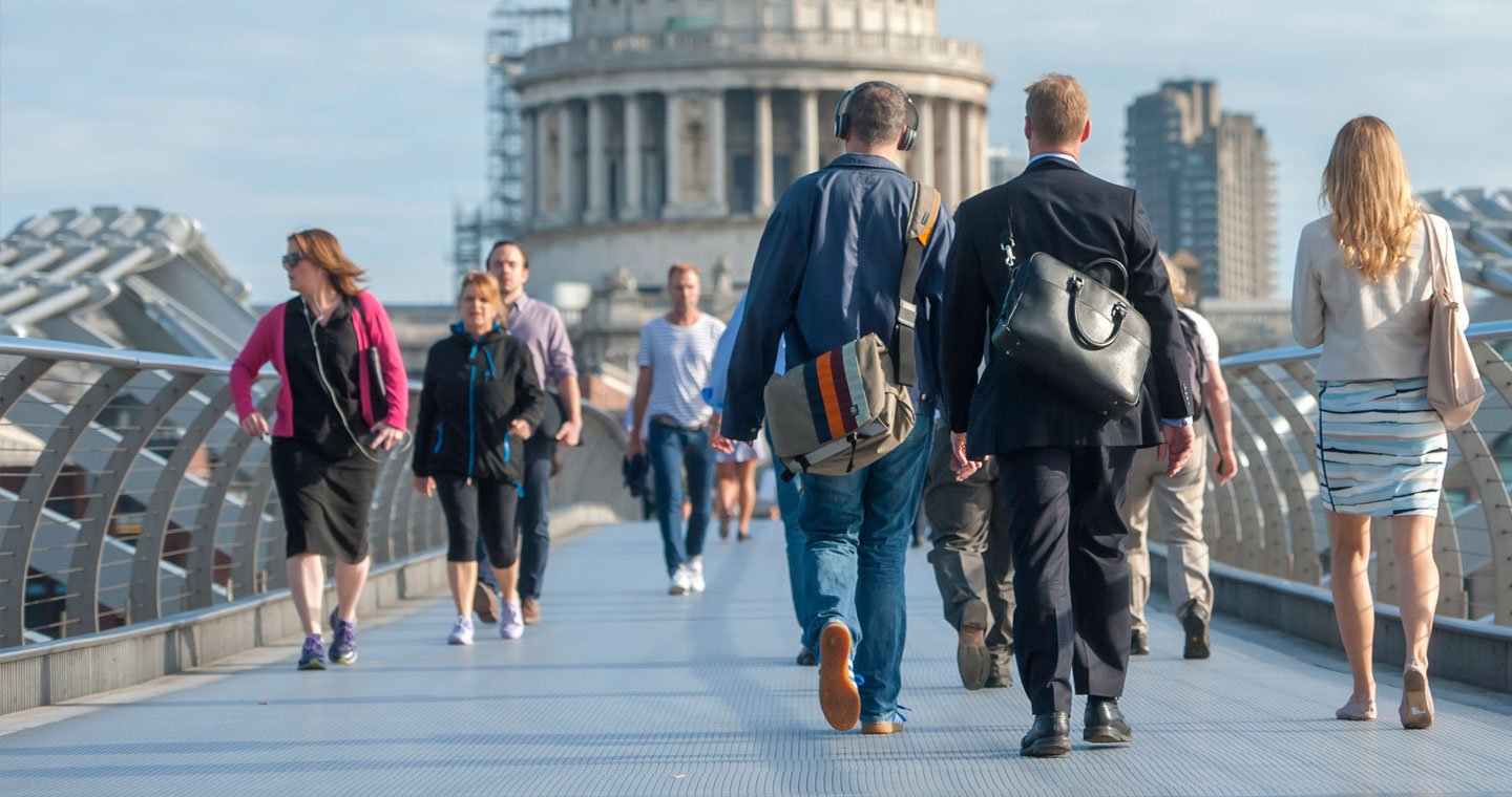 London commuters crossing bridge