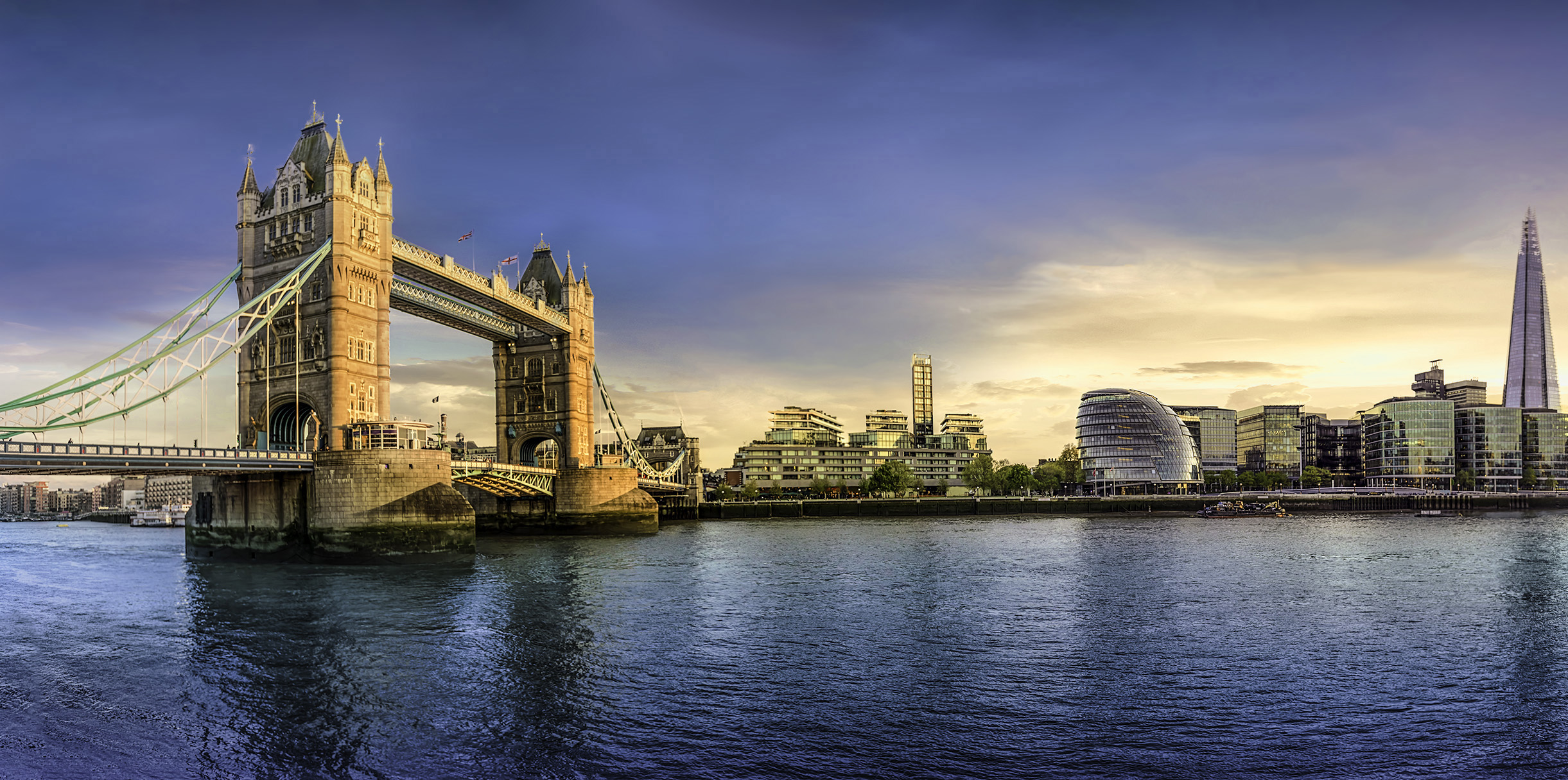 The skyline of London: from the Tower Bridge to London Bridge during sunset time, United Kingdom