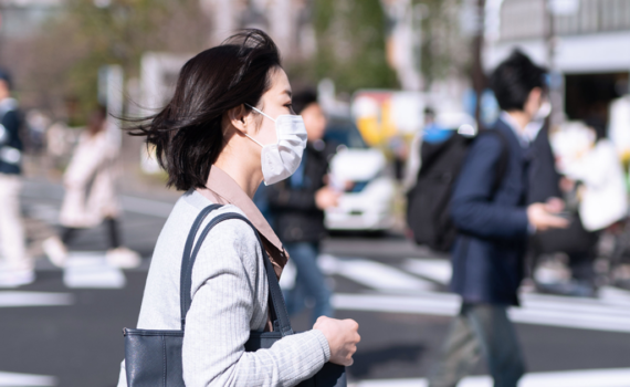 woman wearing mask walking