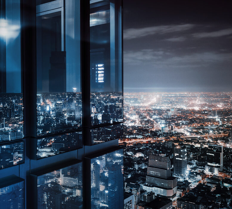 High rise building in city at night