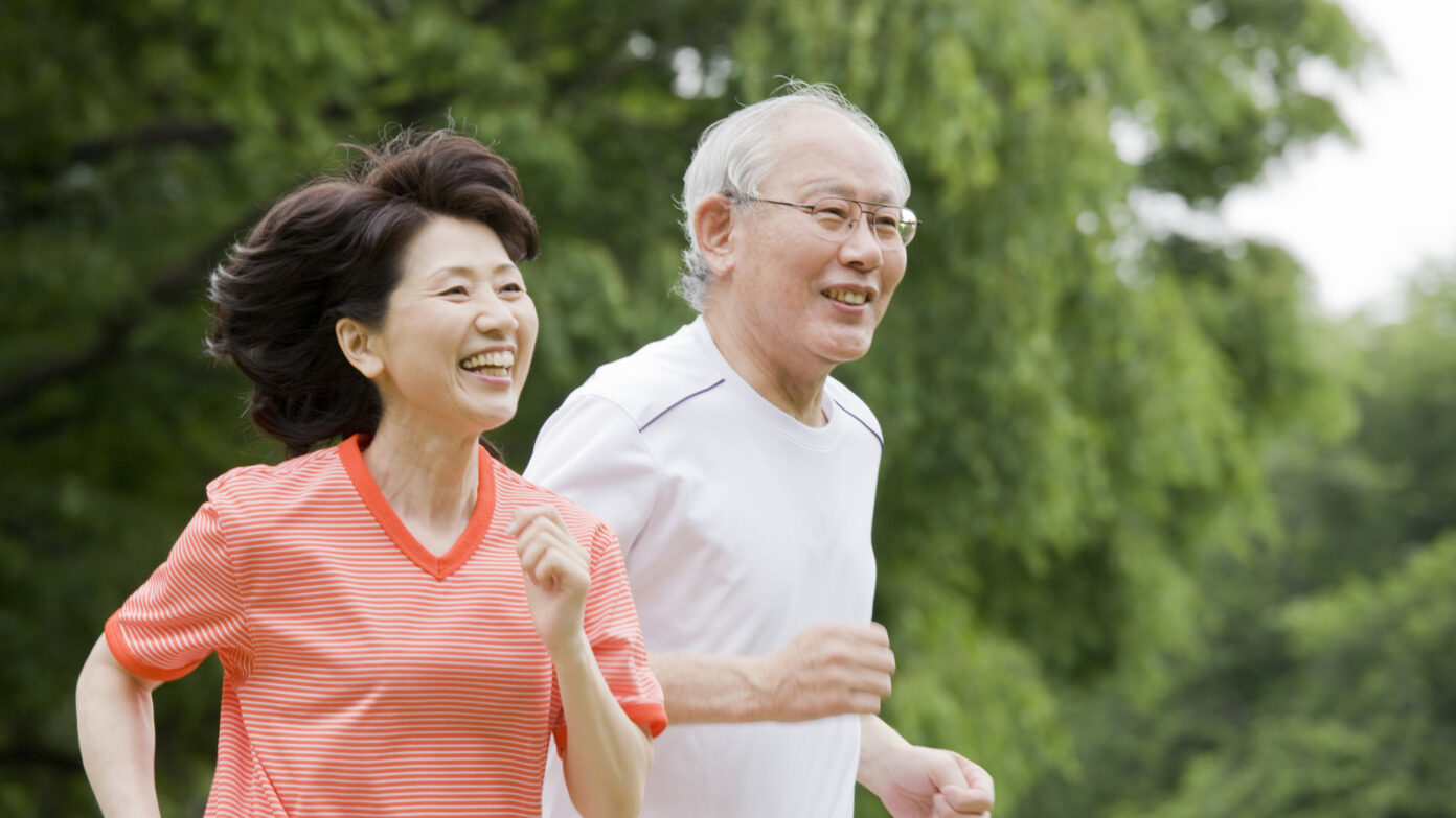 Two people running