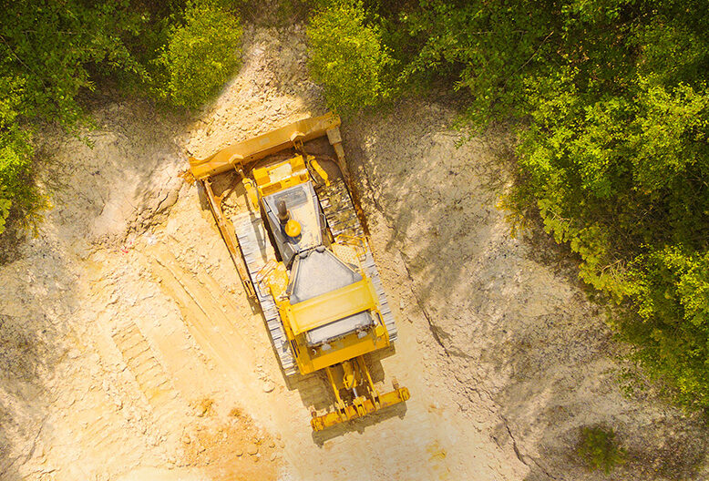 A vehicle moves stone in a quarry.