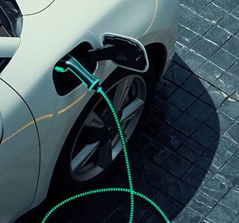 A charging electric vehicle.