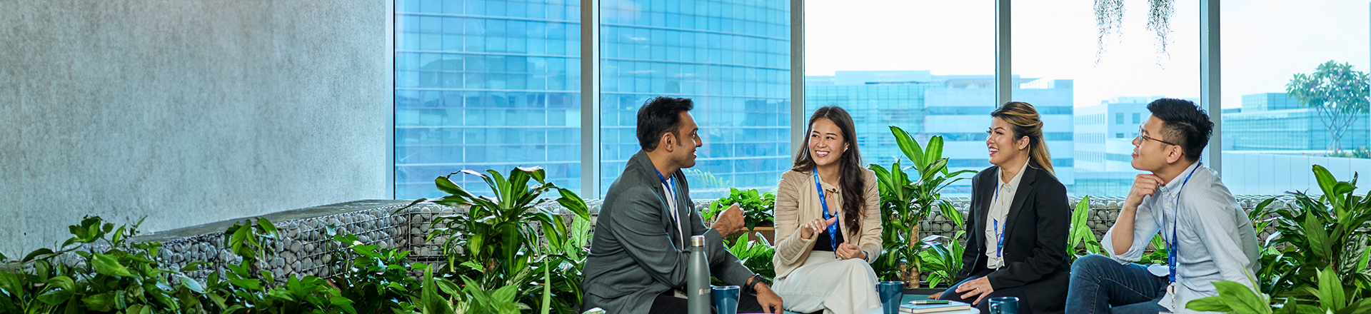 colleagues talking round a table