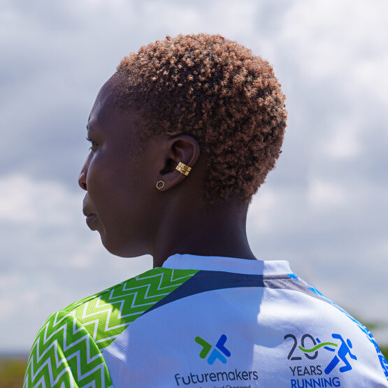 A woman in a Futuremakers top.