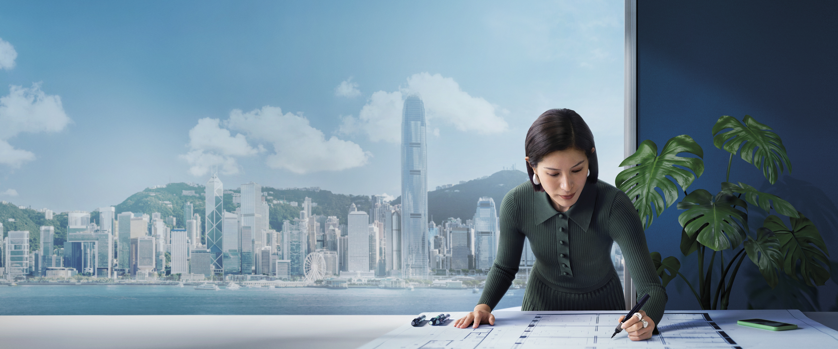 A woman sketches out plans for her business