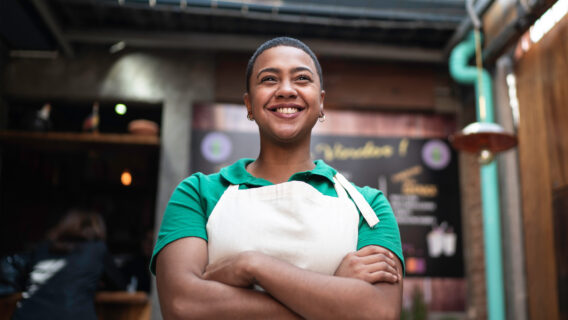 A woman works in a cafe.