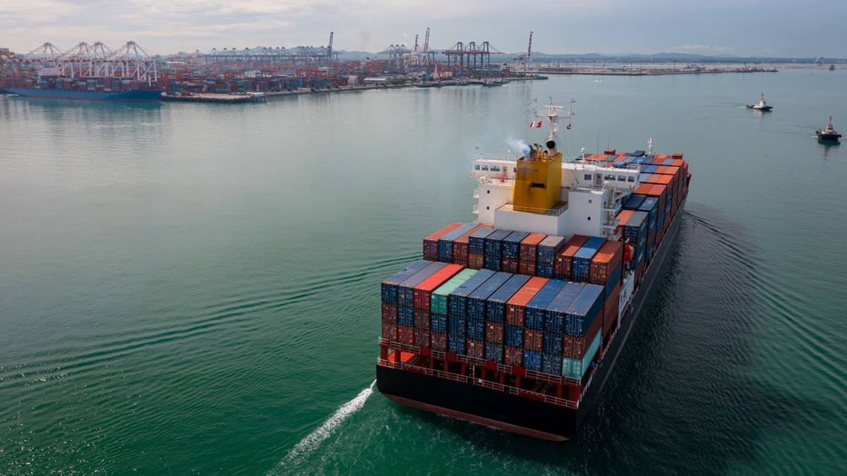 Aerial view of a large container ship in the water