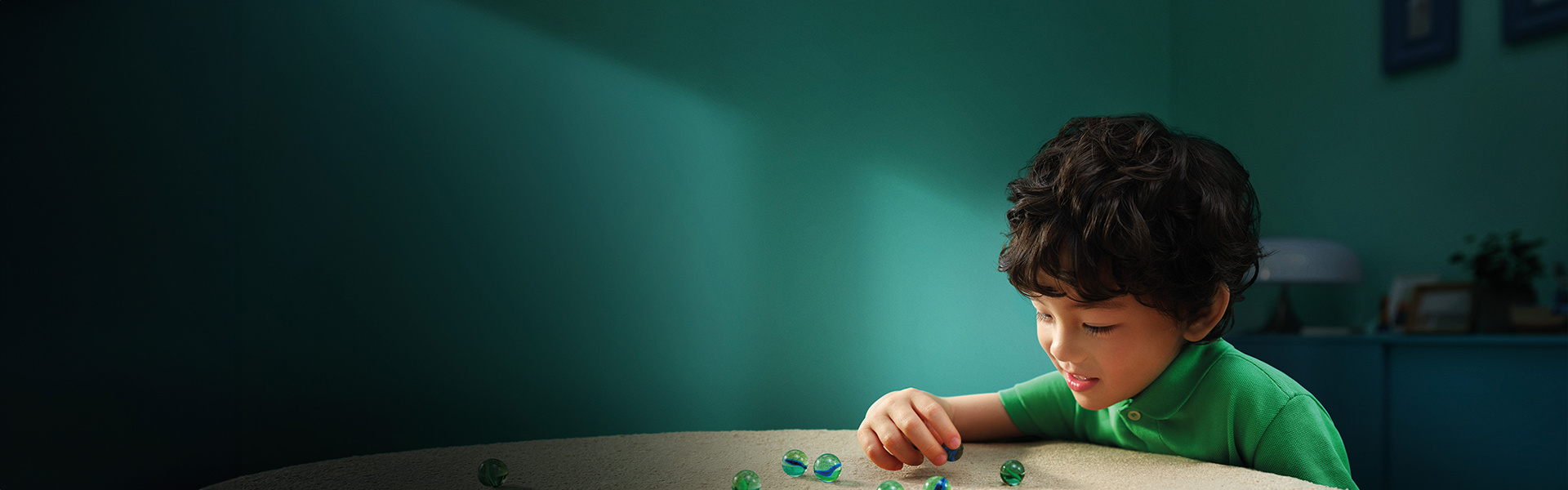 Wealth management: Mother and child playing with wooden blocks