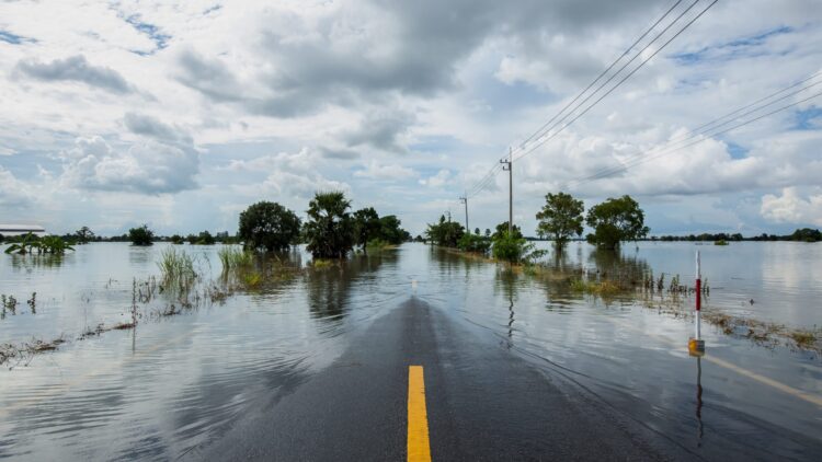 Flood water on either sides of the road