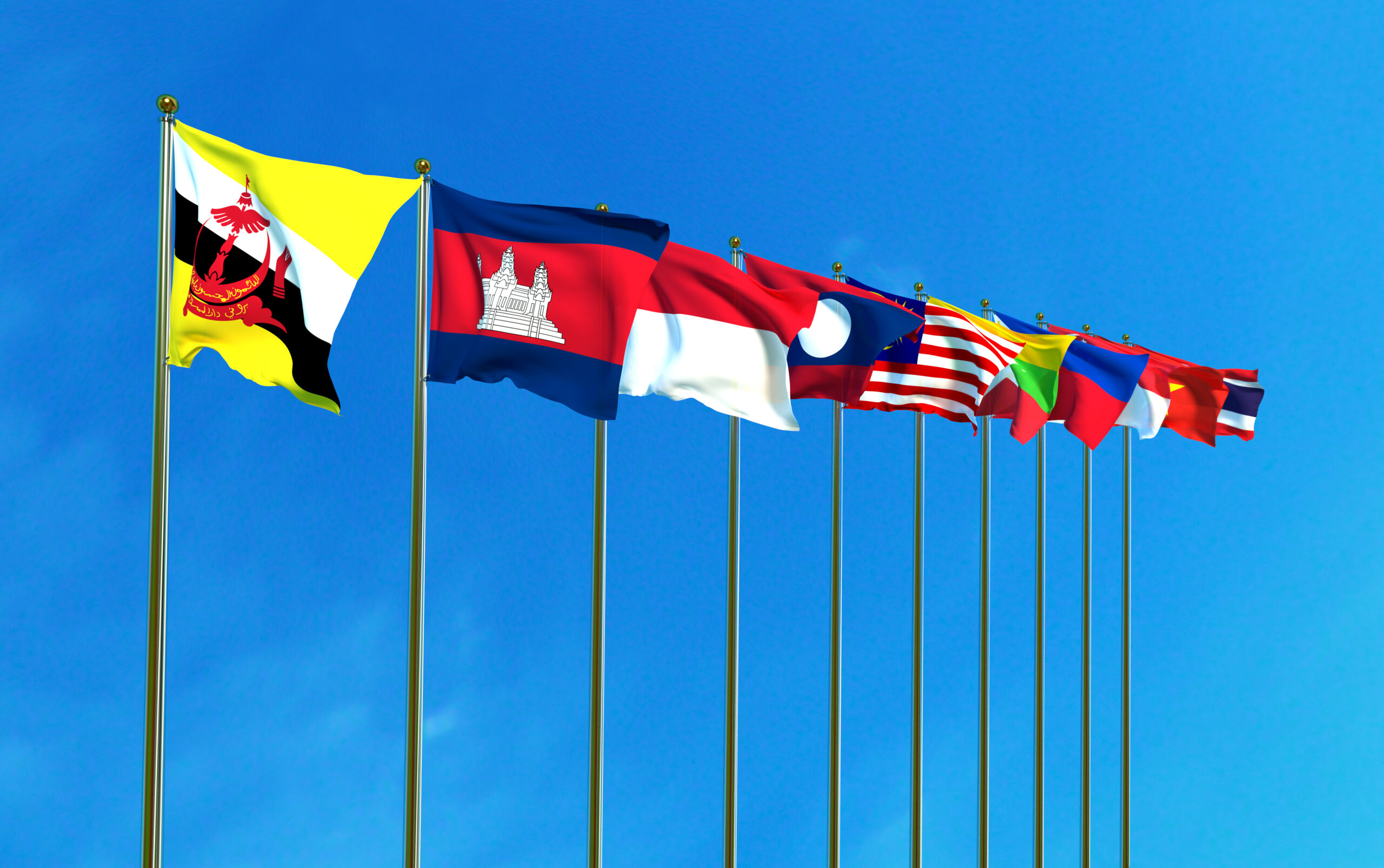 Bright flags against a blue sky