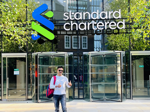 Sankareswaran gives a thumbs up to the camera outside Standard Chartered's London headquarters.