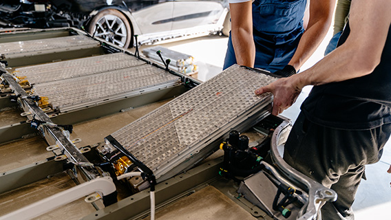 Lithium batteries are installed in a factory.