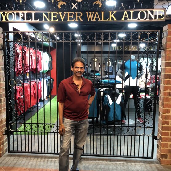 Rajen at an LFC store