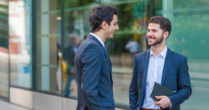 Two men discussing business