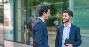 Two men discussing business