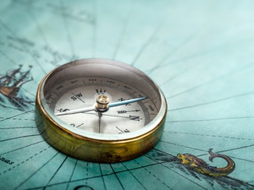 Magnetic compass on a map