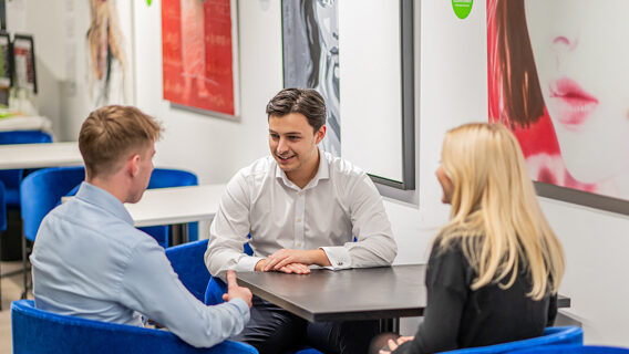 team talking round a table