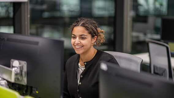 Employee looking at her computer