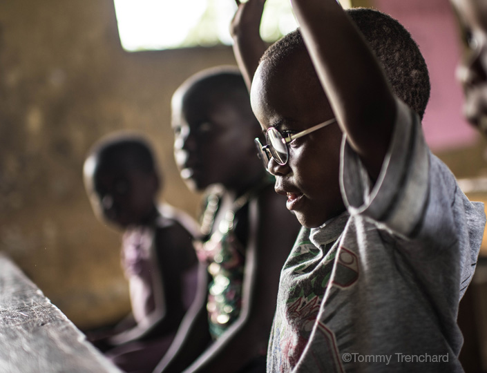 Boys in school, showing how Seeing is Believing is changing lives