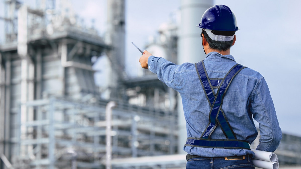 Civil engineering working in an industry
