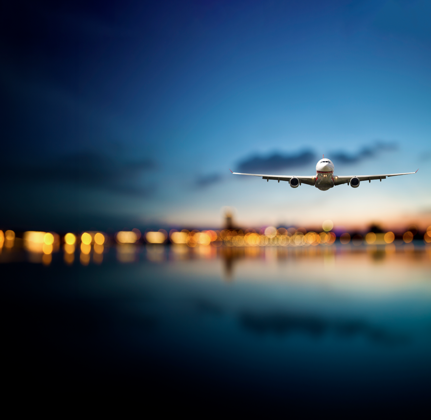 Airplane flying over the sea