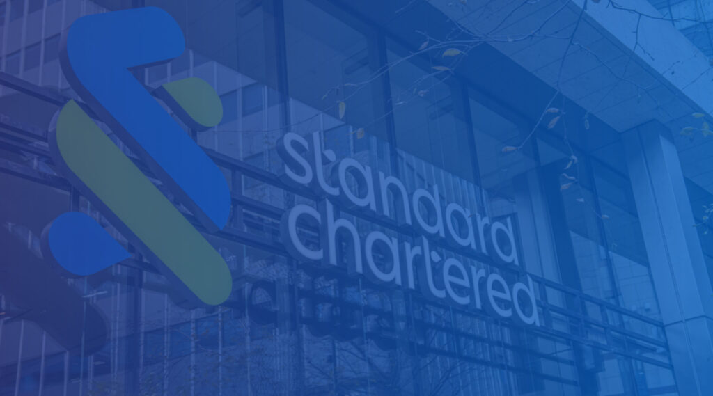The front of Standard Chartered’s London office with a blue overlay.