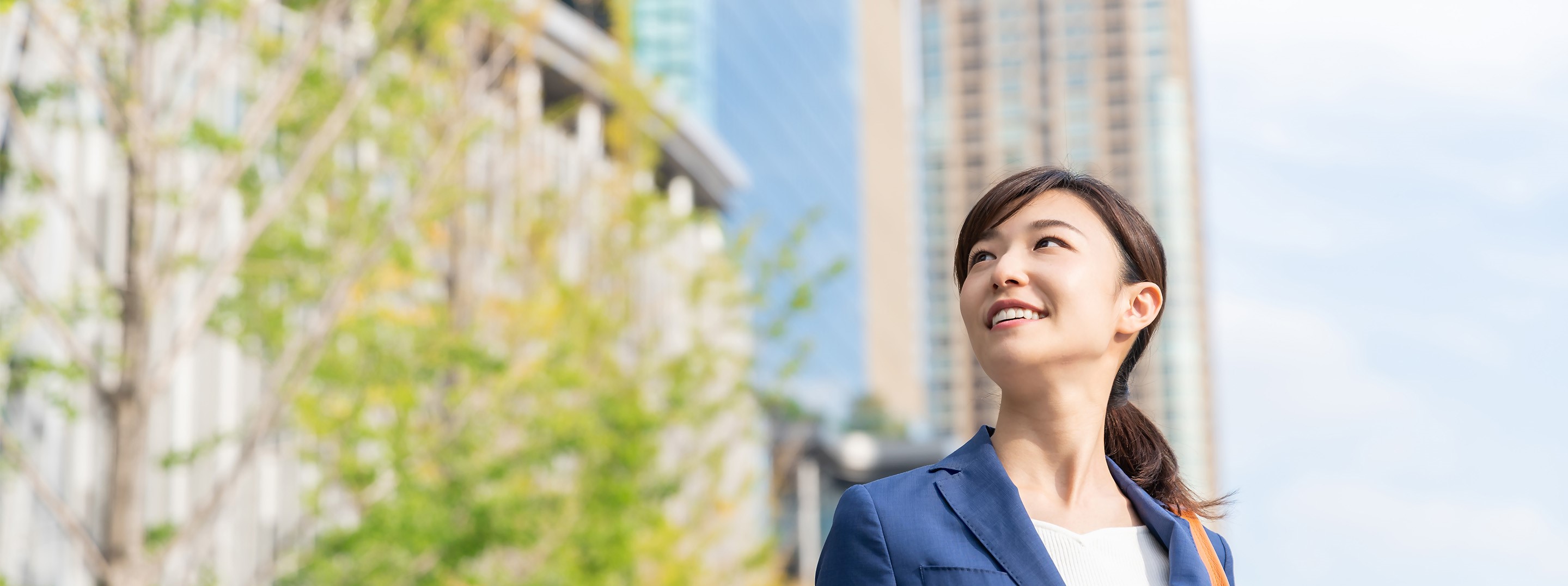 Woman smiling holding phone