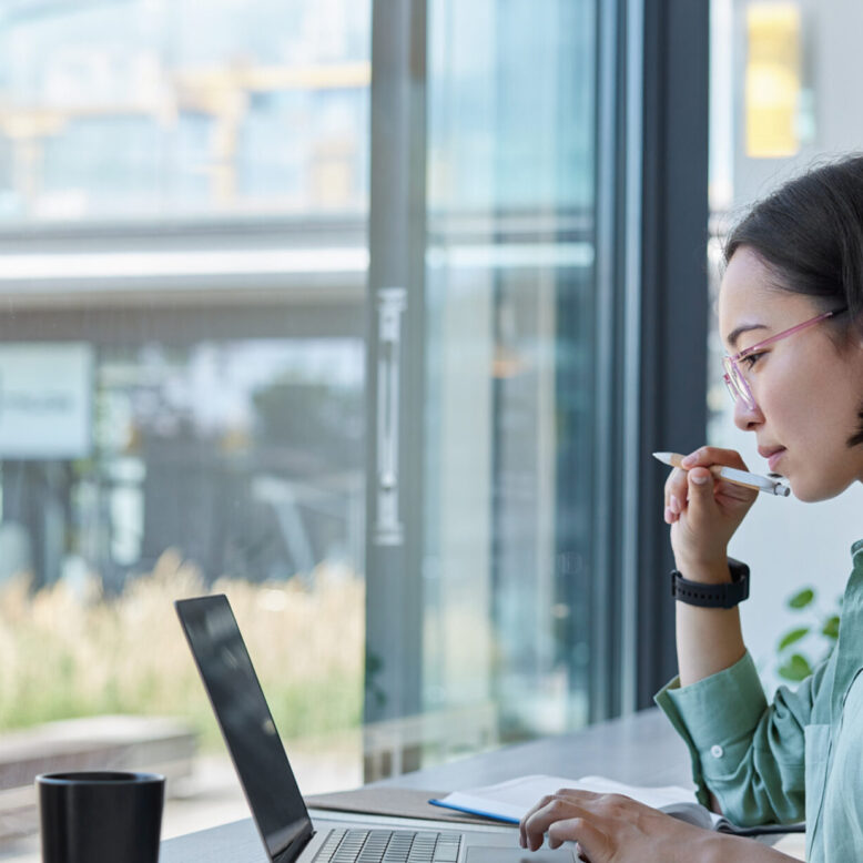 Woman works on laptop