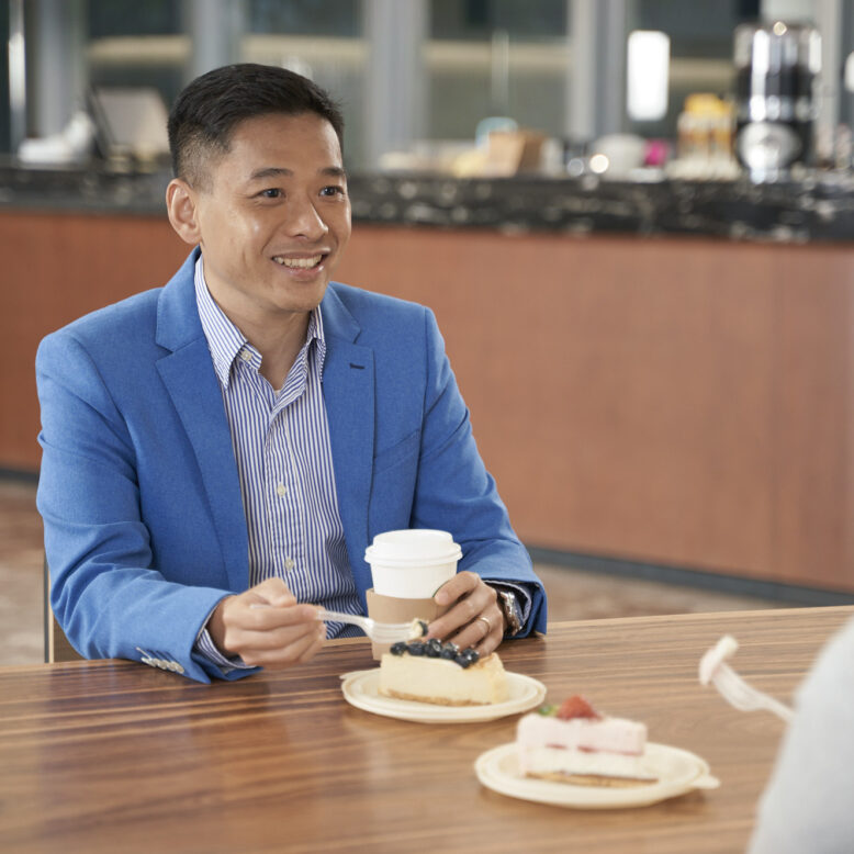 A man with coffee and cake