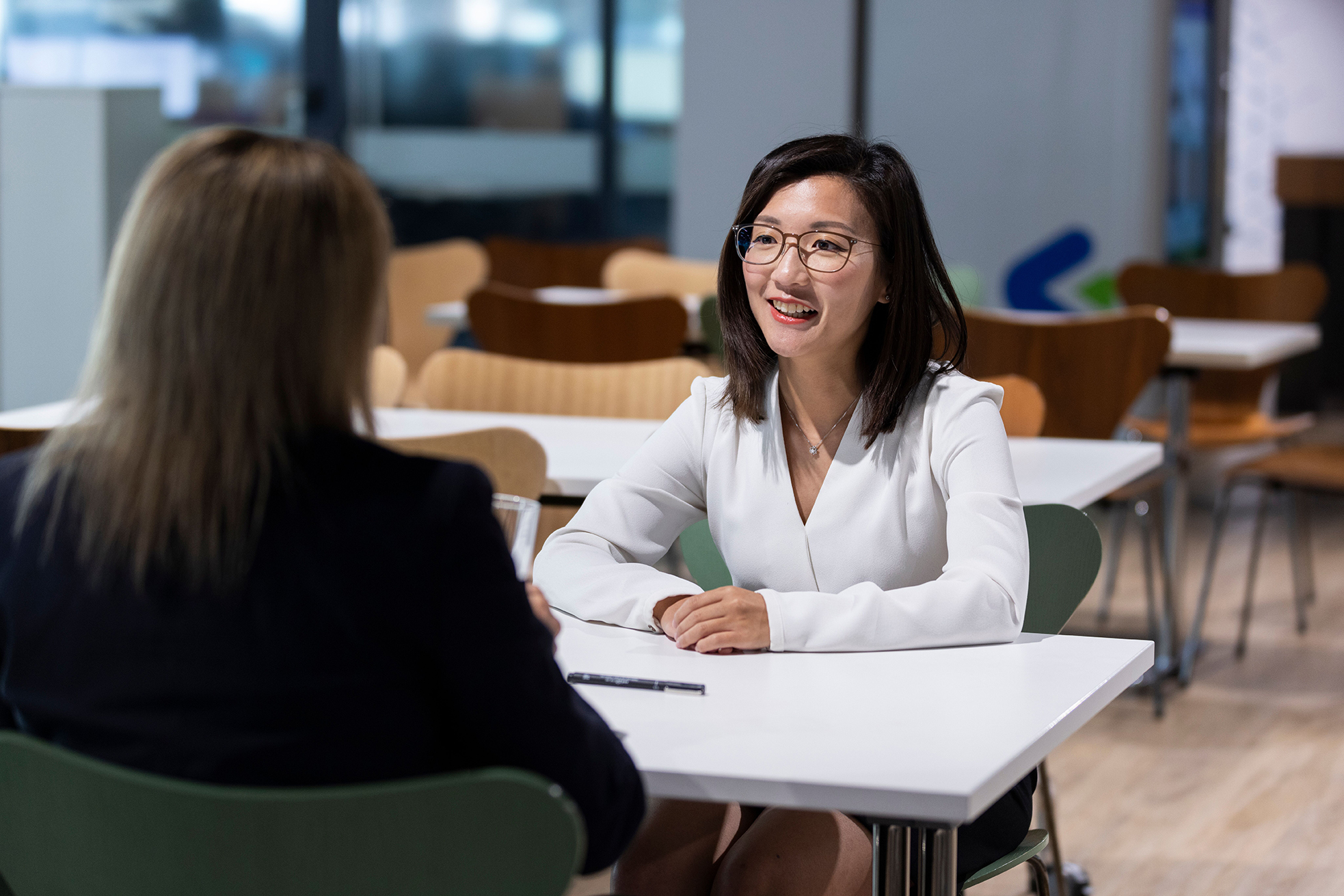 Two women talking to each other