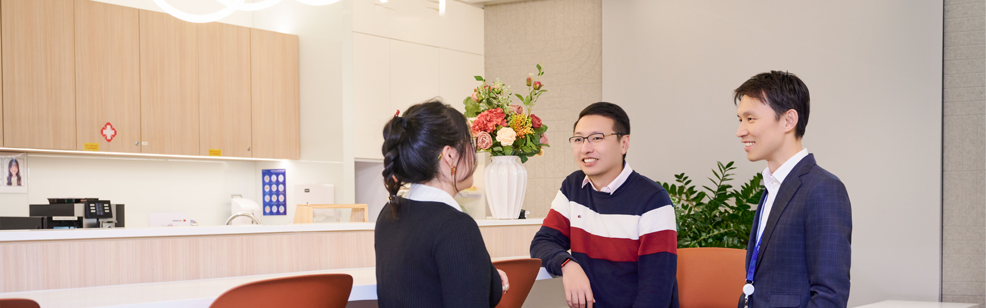 Colleagues talking in an break out area