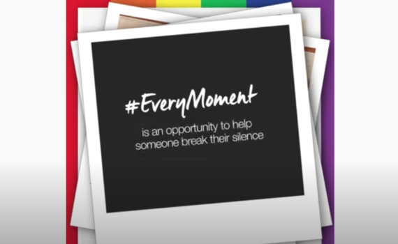 A stack of polaroid photos. The top one says #everymoment.