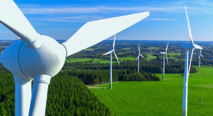 close up image of a wind turbine in a field
