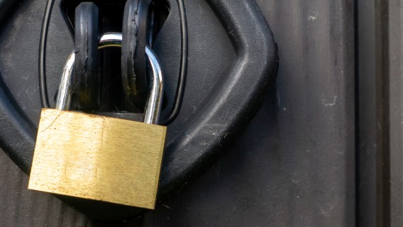 close up image of a brass padlock