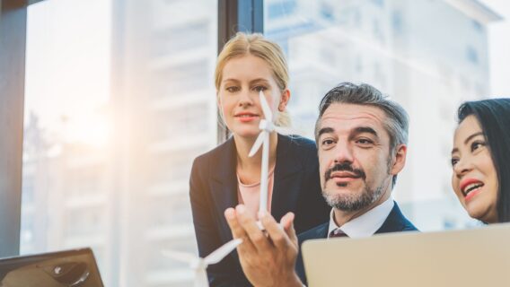 image of 3 business people in a discussion