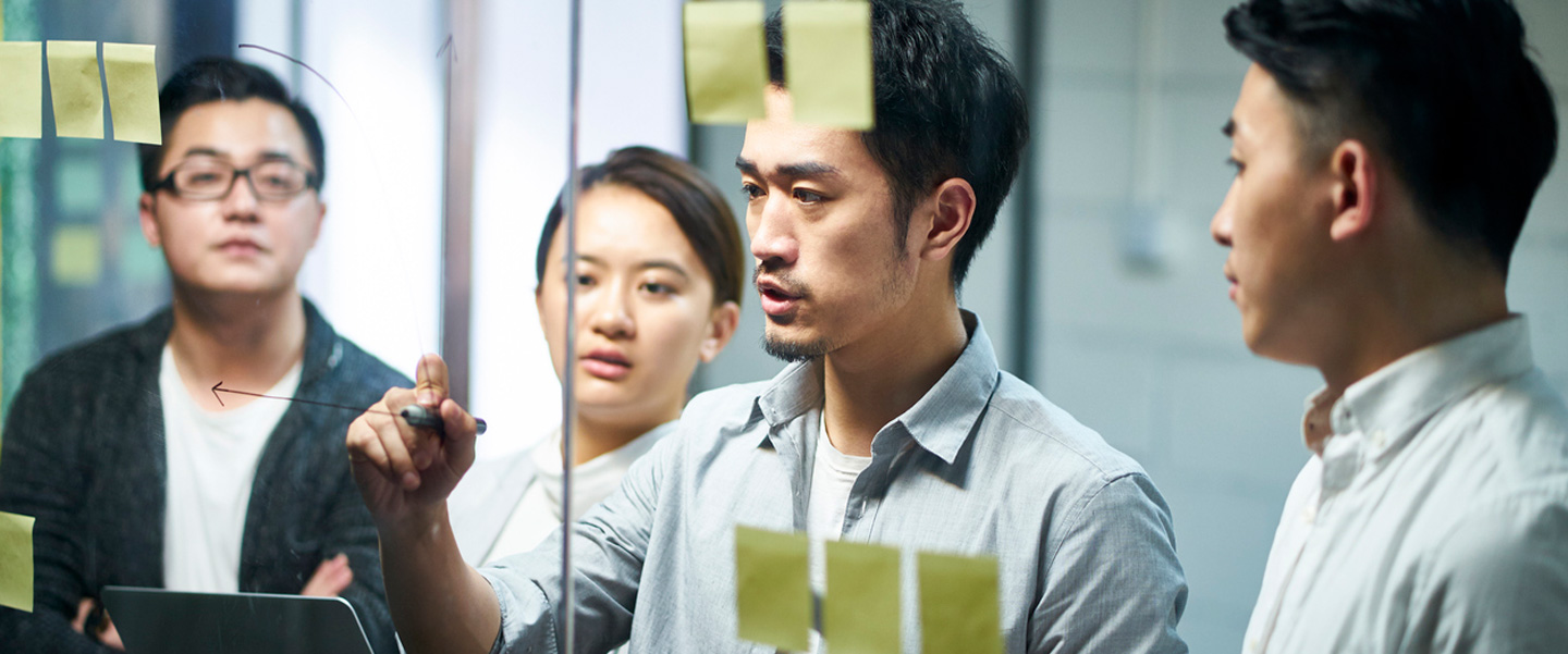 Man Explaining to his colleagues