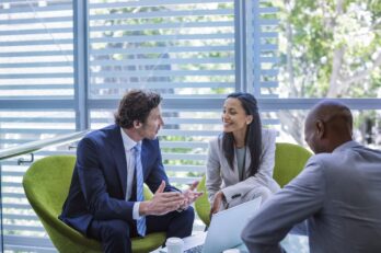 Businessman discussing strategy with colleague