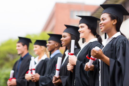 Graduates with scrolls