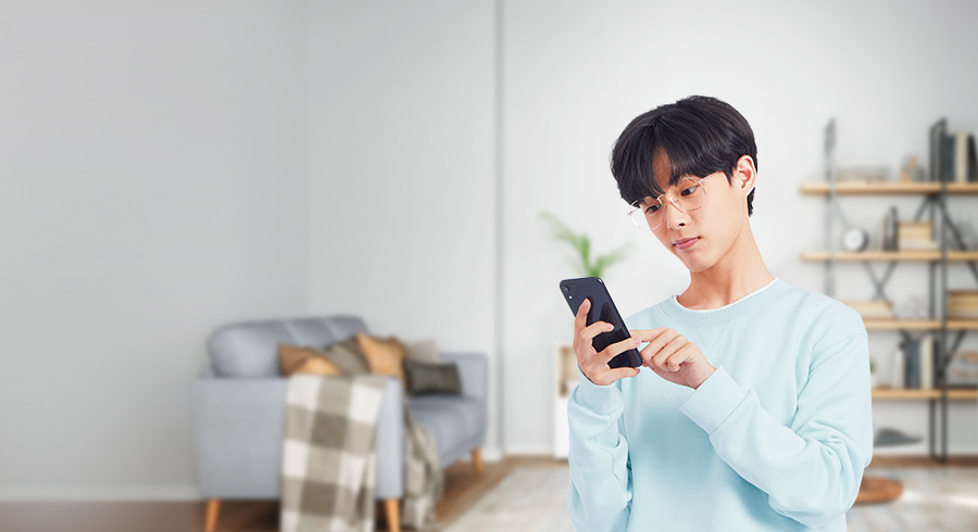 A young man using mobile phone