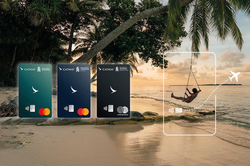 A man on a swing on the beach, card faces of 3 tiers of Standard Chartered Cathay Mastercard