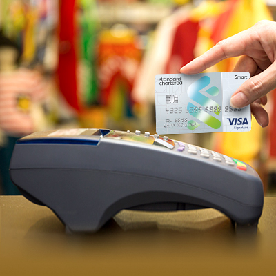 A Smart Card and a credit card terminal machine