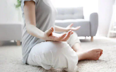Ladying doing yoga at home, enjoy Priority Private Stay At Home Services