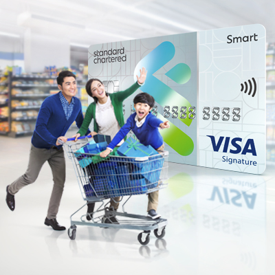 Family are shopping in supermarket, used to promote SC Smart Credit Card