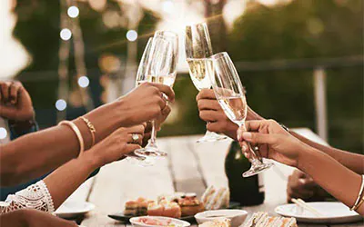 Clinking glasses and say cheers for luxury priority private banking lifestyle experiences