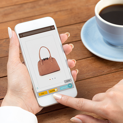 A person shopping online on mobile to earn reward points