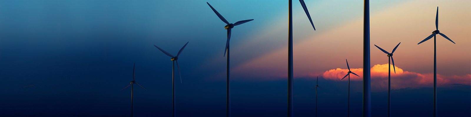 Personal banking need stock photo wind turbine farm at sunset 
